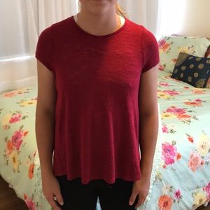 Soprano. Girl’s 10-12. Deep red swing top.